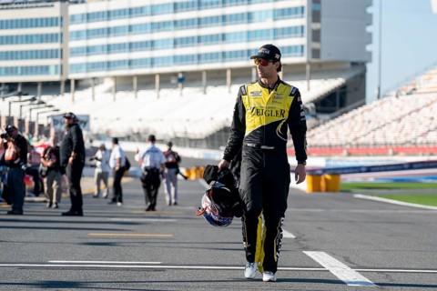 NASCAR XFINITY Driver Josh Bilicki (07) walks pit road before practice for the Drive for the Cure
