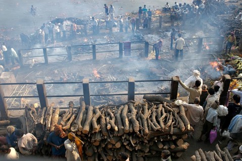 Hindu cremation ceremony at Manikarnika Ghat on banks of holy Ganga river, Varanasi, Uttar Pradesh,