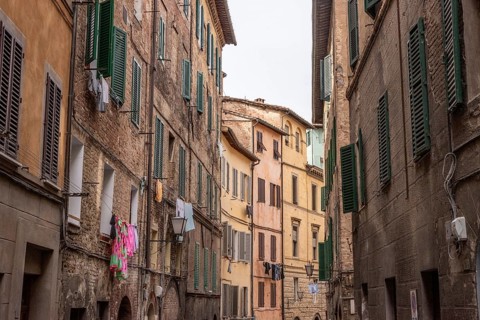 Somewhere in the streets of the old medieval Siena, Italy