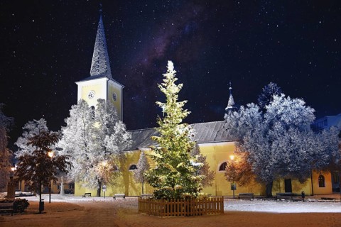 Beautiful old church on Christmas holidays with snow. Church of St. John the Baptist and St. John