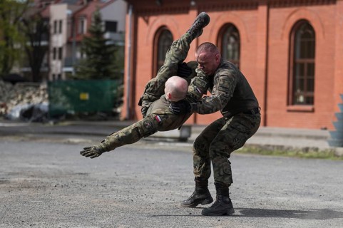 LEGNICA, POLAND, APRIL 26, 2023: Military picnic as part of the Cyber Mil Academy program. Hand to