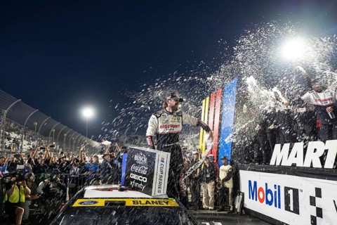 NASCAR Cup Series driver, RYAN BLANEY (12) of High Point, NC, celebrates his win for the Xfinity