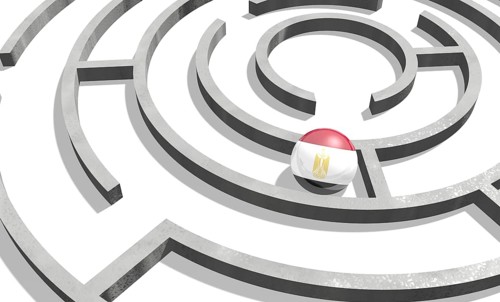 Image relative to politic situation in Egypt. National flag textured sphere in labyrinth. 3d