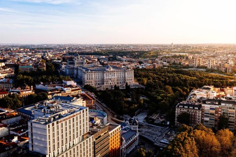 Madrid, Spain, August 24, 2020: Madrid city centre aerial panoramic view at sunset. Royal Palace