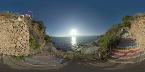 360 photo - Colourful stairs leading down the rocky coast from the hotel area. Waterside scene with