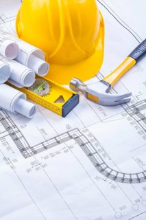 Claw hammer rolled blueprints construction level helmet