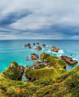 South Island, New Zealand. The picturesque coast of the Pacific Ocean near Nugget Points. Big