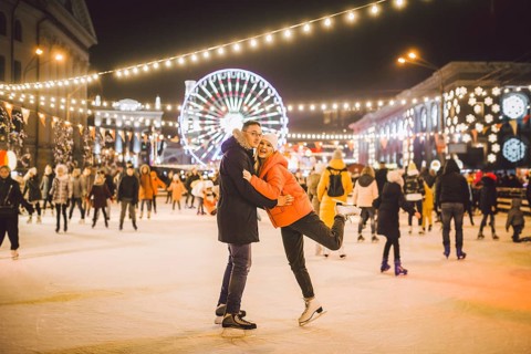 Couple hugging in Saint Valentine's Day. Young romantic couple having fun outdoors in winter. St