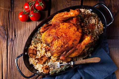 Grilled spicy chicken with pearl barley and mushrooms