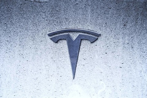 Tesla logo on an electric car
