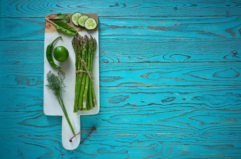 Healthy food vegetables for heart heath on wooden turquoise background