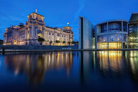 The Reichstag and the Paul Löbe House on the Spree in Berlin during the blue hour
