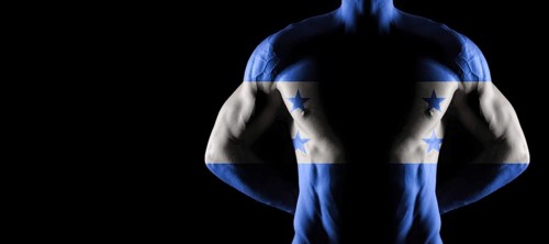 Honduras flag on muscled male torso with abs, black background