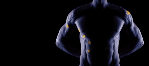 Alaska flag on muscled male torso with abs, Alaska bodybuilding concept, black background