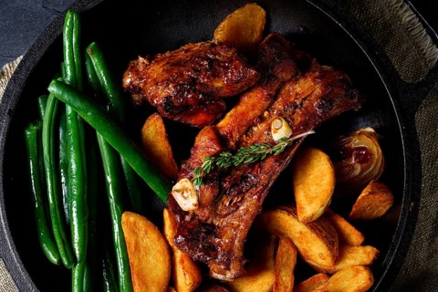Pork with beans and quarter potatoes