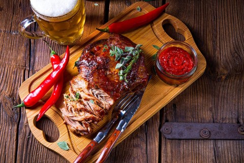 Pork with beer sauce pulled from the oven