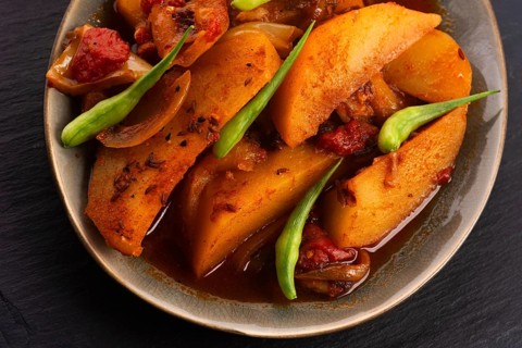 Fried potatoes with paprika sauce. crispy fried patata bravas, fried potatoes with smoked paprika