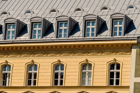 Old building with converted attic, symbol for living space, conversion, capital investment Austria