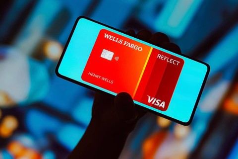 In this photo illustration, the Wells Fargo Reflect Card is displayed on a smartphone screen