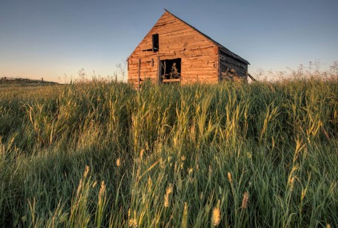 Abandoned Farmhouse Saskatchewan Canada sunset and prairie view