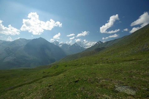 Mountain landscape. Highlands, the mountain peaks, gorges and valleys. The stones on the slopes