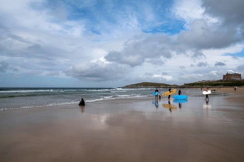 Newquay, United Kingdom, 4 Spetember, 2022:view of Fistral Beach in Newquay with surfers enjoying a