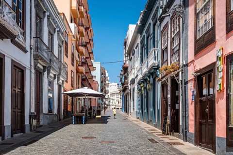 Santa Cruz de La Palma, Spain, August 13, 2021: Shopping street with stores and restaurants in the