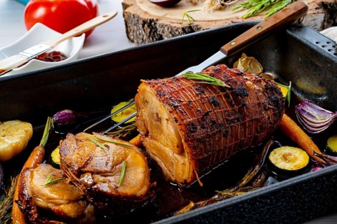 Lecere roll roast with vegetables and herbs