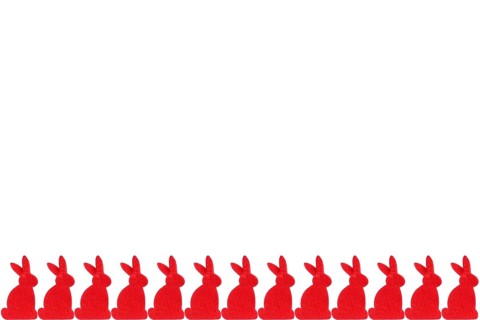 Red Easter bunnies in a row - isolated on white background Row of red easter bunnies - isolated on