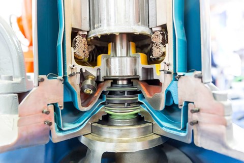 Inside view of a real model of a sliced water turbine. Rotor. A water turbine is a rotary machine