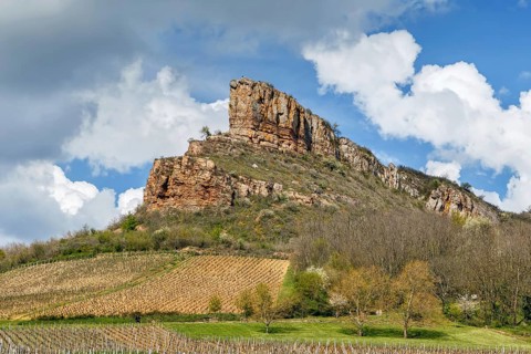 Rock of Solutre (French: Roche de Solutre), is a limestone slope 8 km west of Macon, France