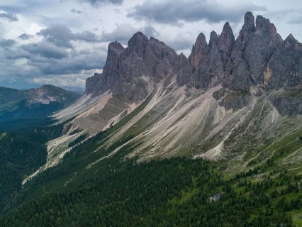 Aerial Drone photo of Santa Magdalena St Maddalena Val di Funes in Dolomites Italian Alps with