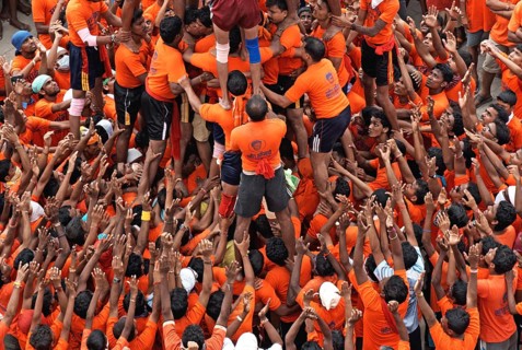 Boys arranging human pyramid on gokulashtami, janmashtami, Bombay Mumbai, Maharashtra, India NO MR