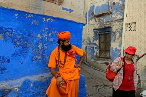 Woman looking at old priest, Jodhpur, Rajasthan, India, Asia