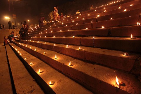 Earthen lamps on staircase to celebrate Dev Deepavali on Ganga River at Varanasi Uttar Pradesh