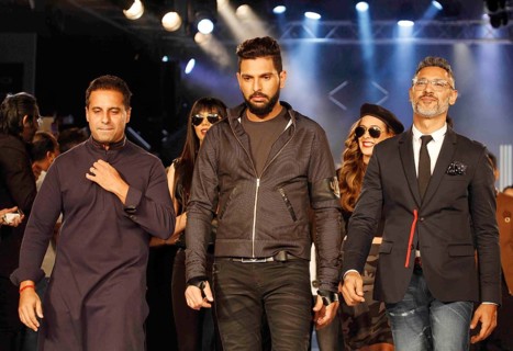 Indian cricket player Yuvraj Singh fashion designers Shantanu Nikhil walks ramp launch clothing