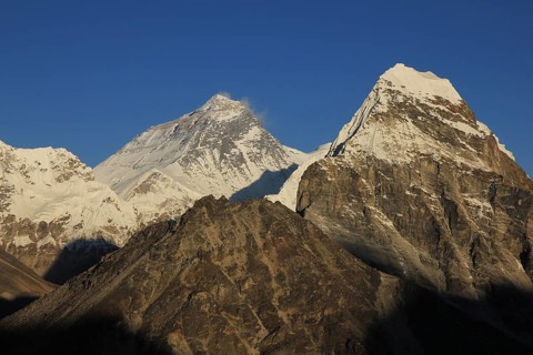 Mt Everest lit by golden evening light, Nepal