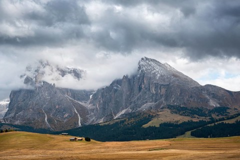 Landscape with beautiful autumn meadow field and the amazing Dolomite rocky peaks the valley of