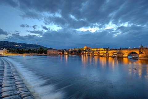 The famous Charles Bridge and Hradcany Castle in Prague at dusk