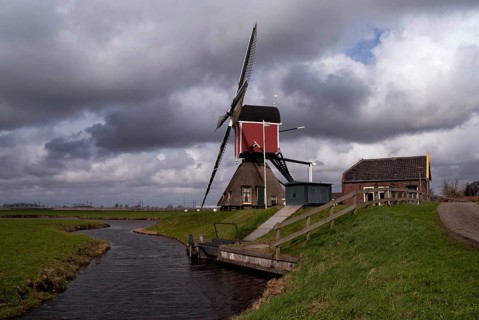 Heavy clouds above the Hoogmadese windmill near the Dutch village Hoogmade