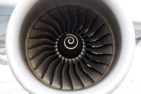 Airbus A380 airplane's engine closeup on a runway at an airport