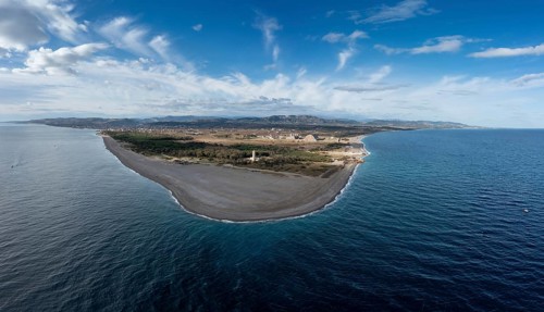 A panorama drone landscape view of Punta Alice beach and lighthouse in Calabria