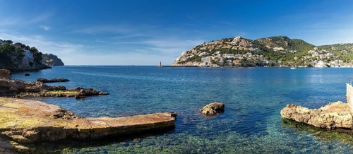 A panorama landscape view of the idyllic natural port and harbour town of Andratx in eastern