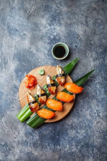 Food, Sashimi sushi set on wooden board. Stone background. Top view
