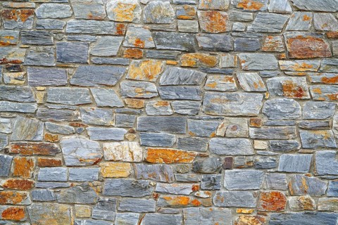 Slate stone masonry stone wall in Andorra Pyrenees
