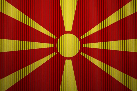 Macedonia Flag painted on the cracked grunge concrete wall