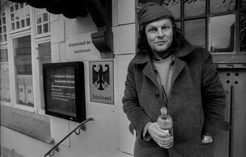 Germany, Sternberg, 12.01.1992, Citizen with liquor bottle in Sternberg / Mecklenburg, labour