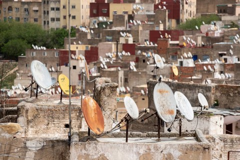 Satellite dishes on the rooftops of residential houses in the medina of Fes, Morocco