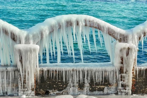 Icy Arch with Icicles on a Background of the Sea Varna, Bulgaria