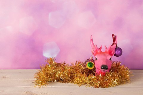 Christmas reindeer with golden ornaments
